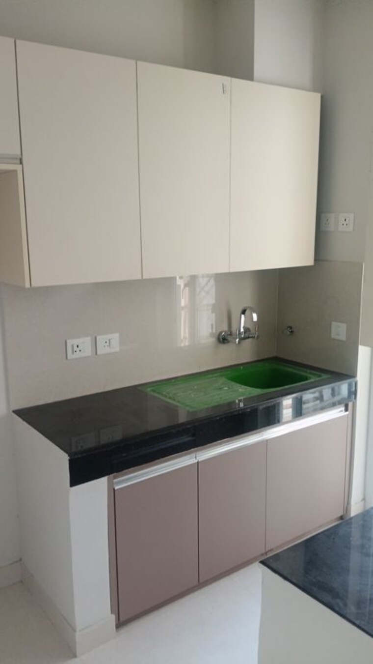 Kitchen, eldeco-live-by-the-greens 2 Bedroom 1155 Sq.Ft. Apartment In Sector 150 Noida 10321143