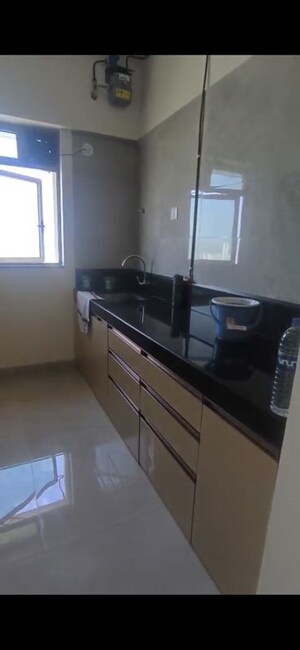 Kitchen in 1 BHK Apartment at Sheth Irene, Malad West – for Sale