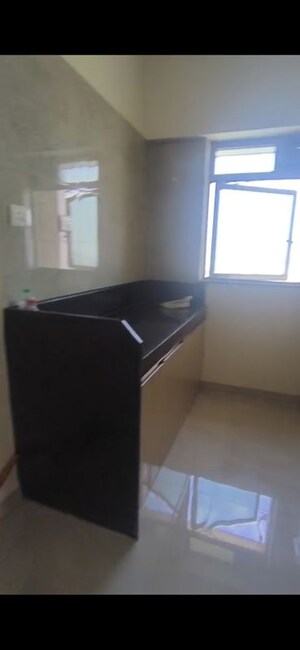 Kitchen in 1 BHK Apartment at Sheth Irene, Malad West – for Sale