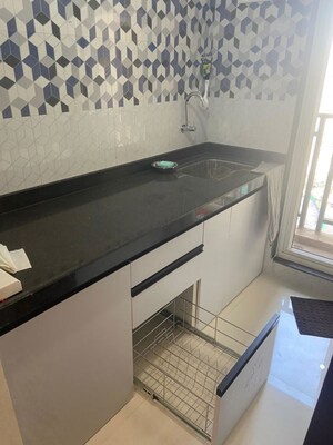 Kitchen in 1 BHK Apartment at Raunak Bliss Phase A3, Ghodbunder Road – for Rent