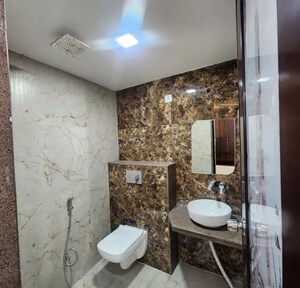Bathroom in 3 BHK Apartment at RNA NG Eclat, Andheri West – for Rent