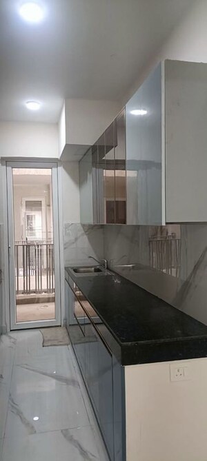 Kitchen in 3.5 BHK Builder Floor at Smart World Gems, Sector 89 – for Rent