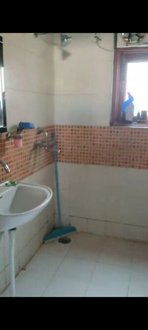 Bathroom in 2 BHK Apartment at Emenox Brave Hearts, Raj Nagar Extension – for Sale