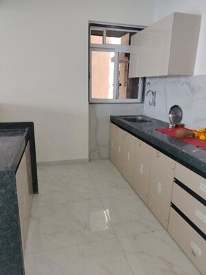 Kitchen in 2 BHK Apartment at Anant Metropolis Insignia Towers, Kasarvadavali – for Rent
