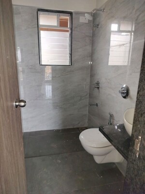 Bathroom in 2 BHK Apartment at Anant Metropolis Insignia Towers, Kasarvadavali – for Rent
