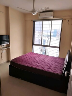 Bedroom in 2 BHK Apartment at Amal Aspen Park, Goregaon East – for Rent