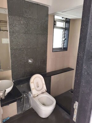 Bathroom in 2 BHK Apartment at Amal Aspen Park, Goregaon East – for Rent
