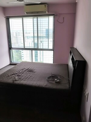 Bedroom in 2 BHK Apartment at Amal Aspen Park, Goregaon East – for Rent