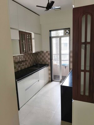 Kitchen in 2 BHK Apartment at Amal Aspen Park, Goregaon East – for Rent