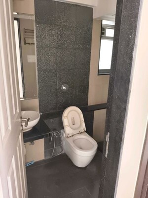 Bathroom in 2 BHK Apartment at Amal Aspen Park, Goregaon East – for Rent