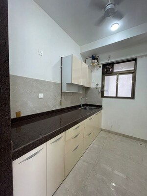 Kitchen in 1.5 BHK Apartment at New Ambivali, Andheri West – for Rent