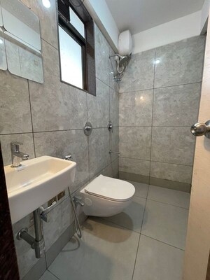 Bathroom in 1.5 BHK Apartment at New Ambivali, Andheri West – for Rent