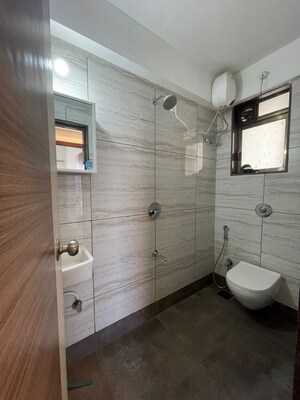 Bathroom in 1.5 BHK Apartment at New Ambivali, Andheri West – for Rent