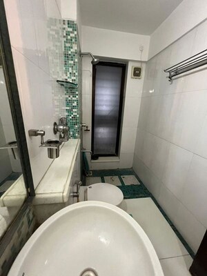 Bathroom in 3 BHK Apartment at DB Realty Shagun Towers, Goregaon East – for Rent