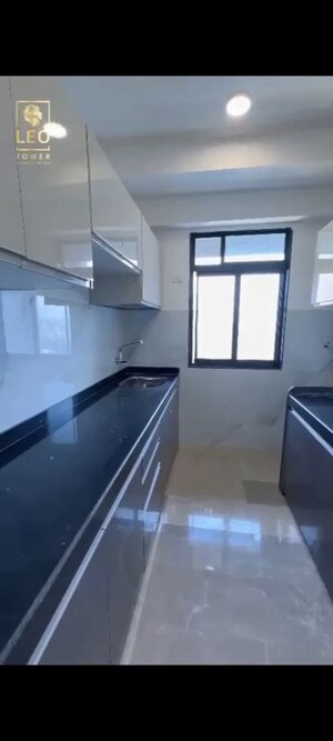 Kitchen in 2 BHK Apartment at Dev Leo Tower, Oshiwara – for Sale