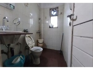 Washroom in 2 BHK Apartment at Minal Apartments, Andheri East – for Rent