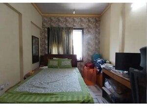 Bedroom in 2 BHK Apartment at Minal Apartments, Andheri East – for Rent