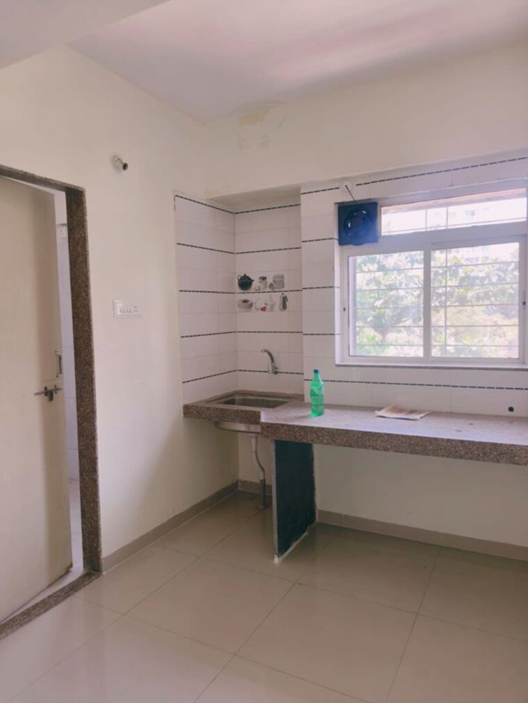 Kitchen, wadgaon sheri 1 Bedroom 557 Sq.Ft. Apartment In Wadgaon Sheri Pune 10321614