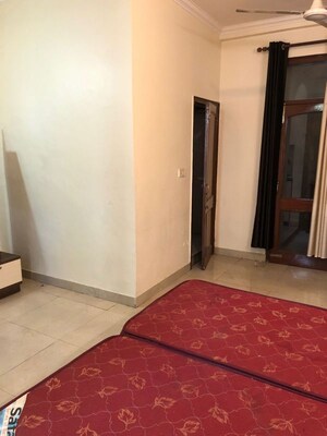 Bedroom in 2 BHK Builder Floor at Sushant Lok I – for Rent