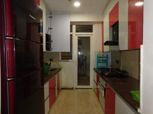 Kitchen in 4 BHK Apartment at Spring Meadows, Tech Zone 4 Greater Noida – for Rent