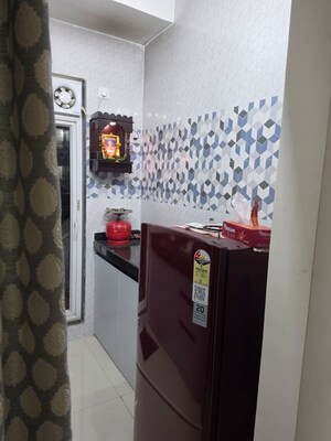 Kitchen in 1 BHK Apartment at Raunak Bliss Thane, Ghodbunder Road – for Rent