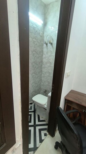 Bathroom in 1.5 BHK Builder Floor at Subhash Nagar – for Rent