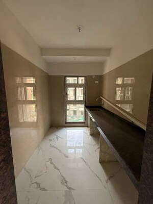 Building Lobby in 2 BHK Apartment at VKG Beverly Hills, Andheri East – for Rent