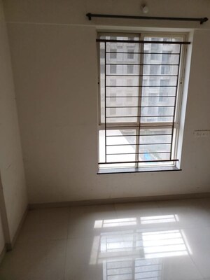 Bedroom in 2 BHK Apartment at Little Earth Apartments, Mamurdi – for Rent