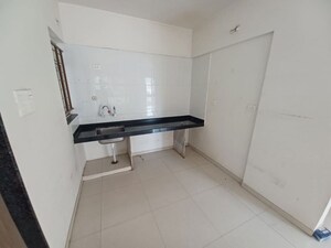 Kitchen in 2 BHK Apartment at Little Earth Apartments, Mamurdi – for Rent