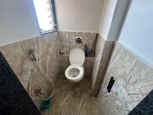 Bathroom in 1 BHK Apartment at Diamond White Stone, Wagholi – for Rent