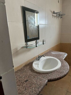 Bathroom in 3 BHK Apartment at Parsvnath Planet, Gomti Nagar – for Rent