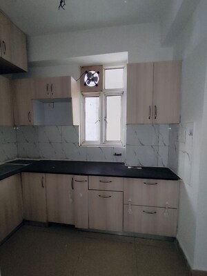 Kitchen in 2 BHK Apartment at Supertech Cape Town, Sector 74 – for Rent