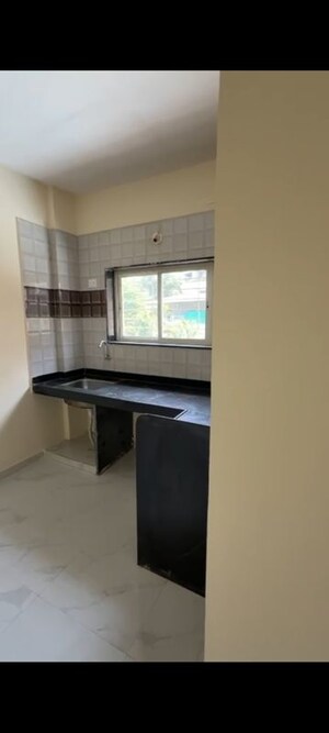 Kitchen in 1 BHK Builder Floor at Datta Krupa Residency, Dhayari – for Rent
