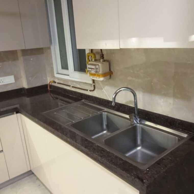 Kitchen, gulmohar park 3 Bedroom 230 Sq.Yd. Builder Floor In Gulmohar Park Delhi 10322247