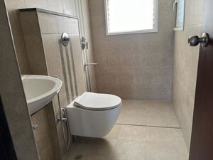 Bathroom in 3 BHK Apartment at Puravankara Silversands, Mundhwa – for Rent