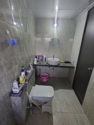 Bathroom in 3 BHK Apartment at Saarrthi Skybay, Mahalunge – for Rent