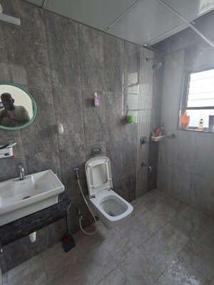 Bathroom in 3 BHK Apartment at Saarrthi Skybay, Mahalunge – for Rent