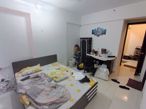 Bedroom in 3 BHK Apartment at Saarrthi Skybay, Mahalunge – for Rent