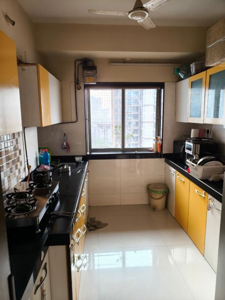 Kitchen, romell-aether 2 Bedroom 950 Sq.Ft. Apartment In Goregaon East Mumbai 10322339