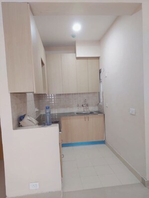 Kitchen in 3 BHK Apartment at Amrapali Dream Valley, Tech Zone 4 Greater Noida – for Rent
