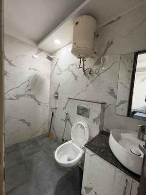 Bathroom in 2.5 BHK Builder Floor at Freedom Fighters Enclave – for Rent