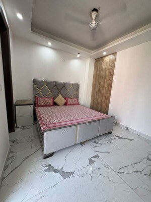 Bedroom in 2.5 BHK Builder Floor at Freedom Fighters Enclave – for Rent