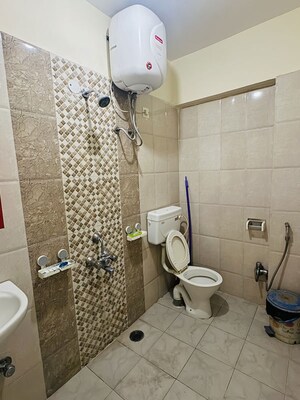 Bathroom in 2 BHK Apartment at Roopena Agrahara – for Rent