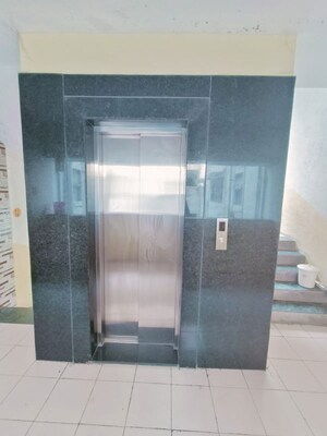 Building Lobby in 2 BHK Apartment at Punyadham Society, Wadgaon Sheri – for Rent