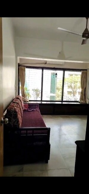 Living Room in 1 BHK Apartment at Goregaon West – for Rent