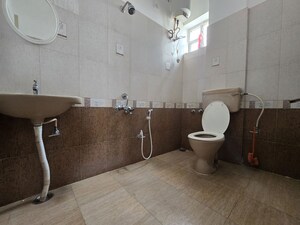 Bathroom in 3 BHK Apartment at Scion Enclave, Kodihalli – for Rent