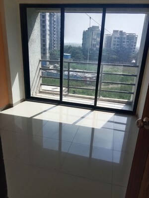 Room in 2 BHK Apartment at Navkar City Phase II, Naigaon East – for Rent