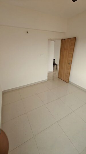 Room in 2 BHK Apartment at Kumar Samruddhi Society, Vishrantwadi – for Rent