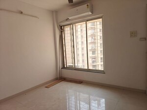 Bedroom in 2 BHK Apartment at Puranik City, Kasarvadavali – for Rent