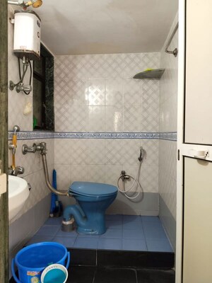 Bathroom in 1 BHK Apartment at Ami Vini Solitaire, Dahisar West – for Rent